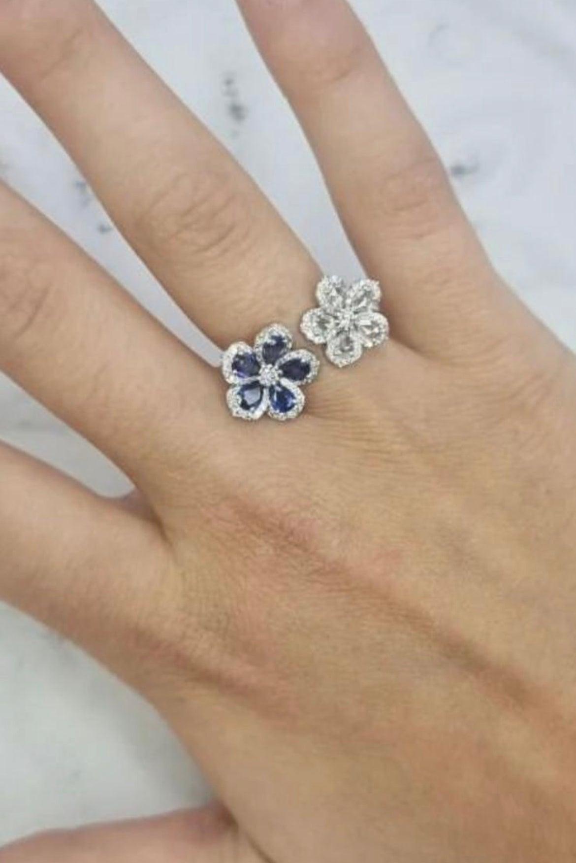 PLATINUM BLUE SAPPHIRE AND DIAMOND FLOWER RING