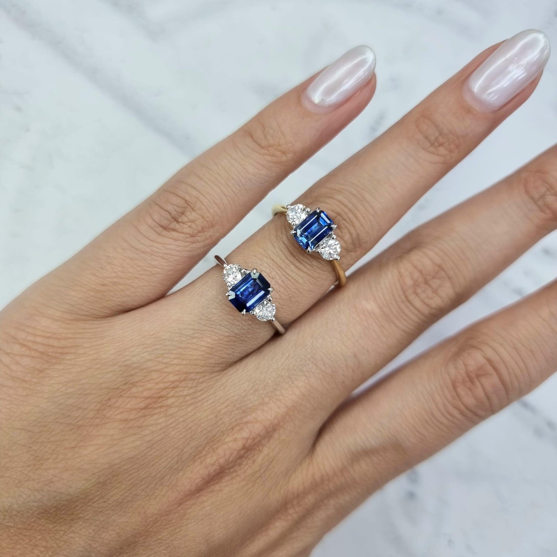 BLUE SAPPHIRE OCTAGONAL THREE STONE RINGS