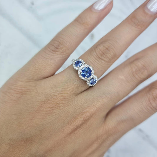 PLATINUM BLUE SAPPHIRE THREE STONE HALO RINGS